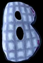 A puffed fabric letter B in a blue check.
