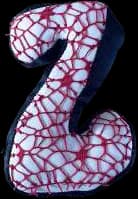 A puffed fabric letter Z covered in a red net print.
